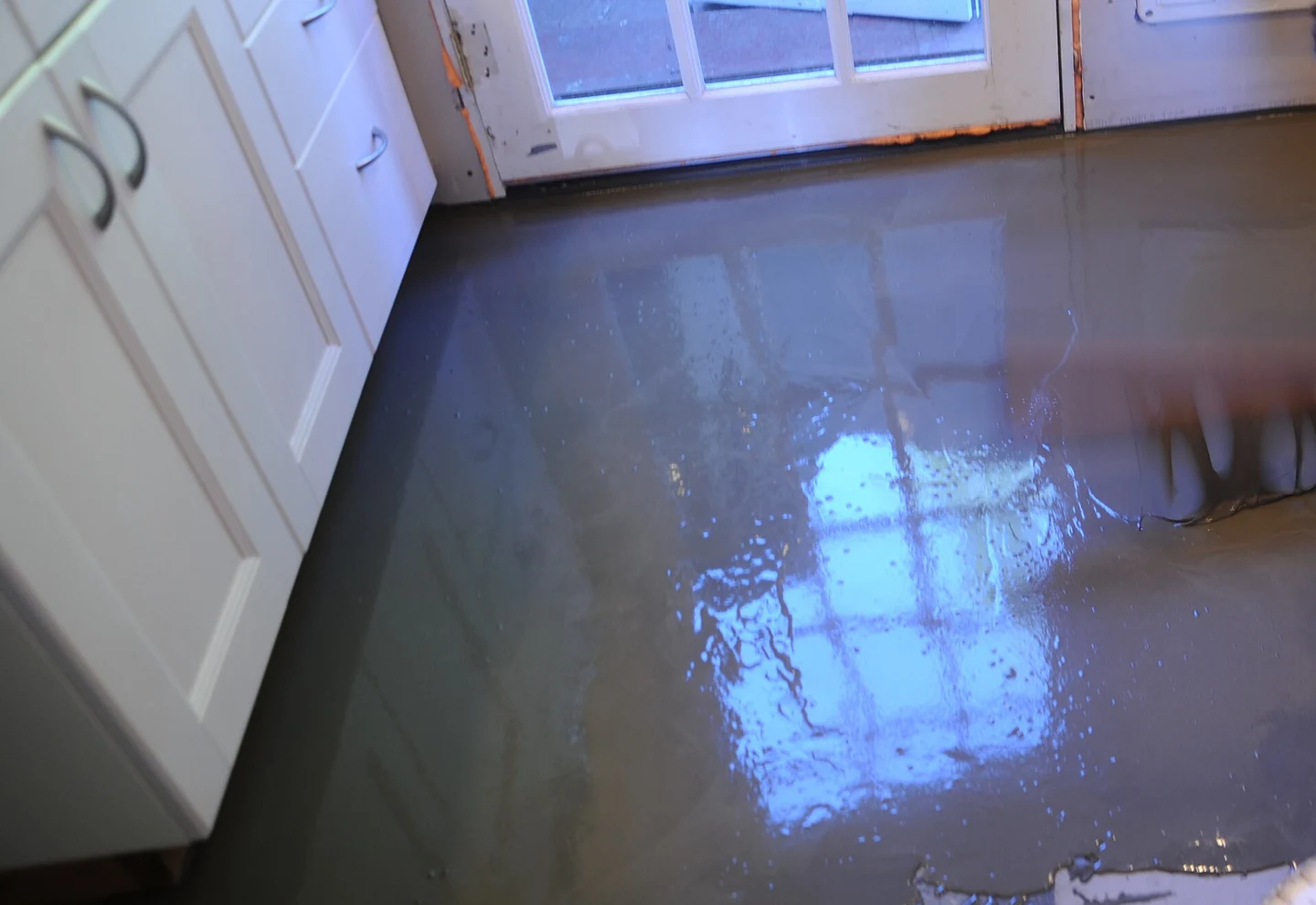 Self-leveling cementitious floor installation